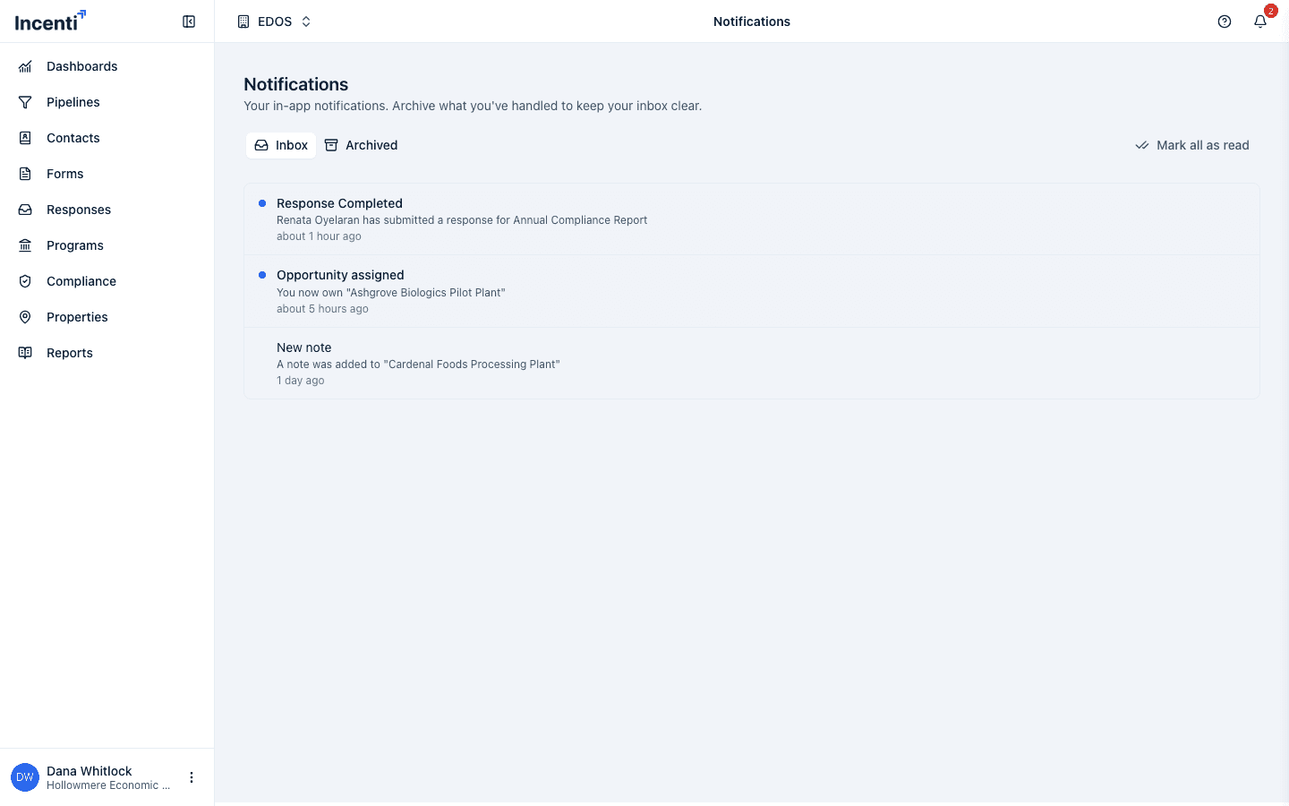 The Notifications page with Inbox and Archived tabs, a Mark all as read button, and three notifications each with a title, message, and time, the unread ones shaded with a blue dot.