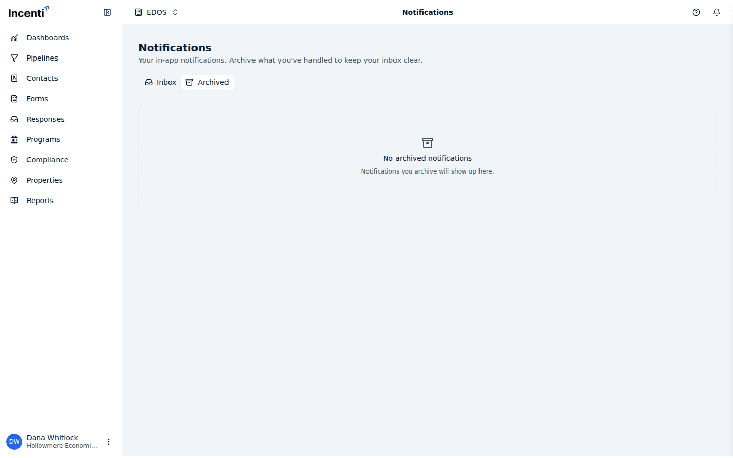 The Notifications page with the Archived tab selected, listing notifications that have been archived and the restore icon on a row.